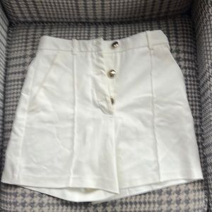 Zara white big gold button shorts.